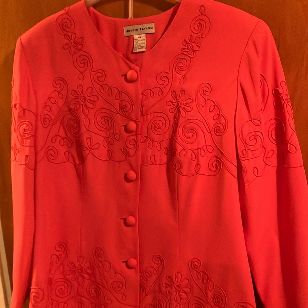 Coral suit.